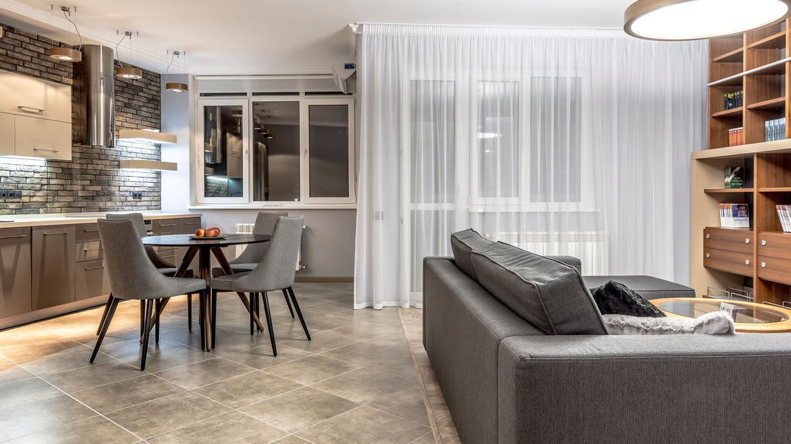 A spotless open-plan living and dining room after a clean